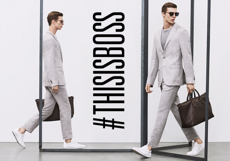 Model Tim Schumacher dons a pale grey suit from BOSS by Hugo Boss spring-summer 2016 range.