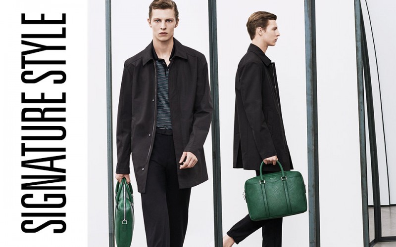 Tim Schumacher embraces sleek lines in a lightweight coat and polo shirt from BOSS by Hugo Boss.