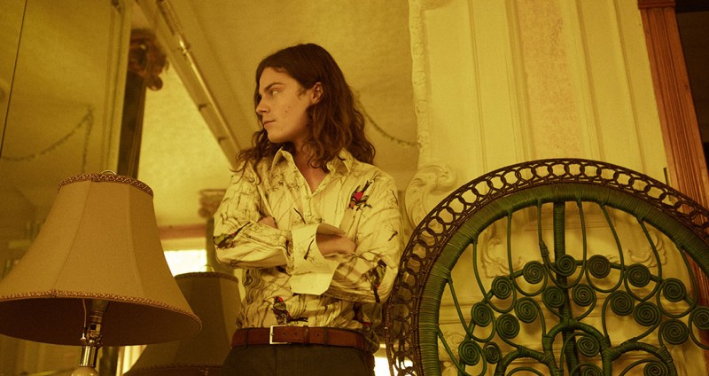 BØRNS wears shirt Dolce & Gabbana and trousers Prada.