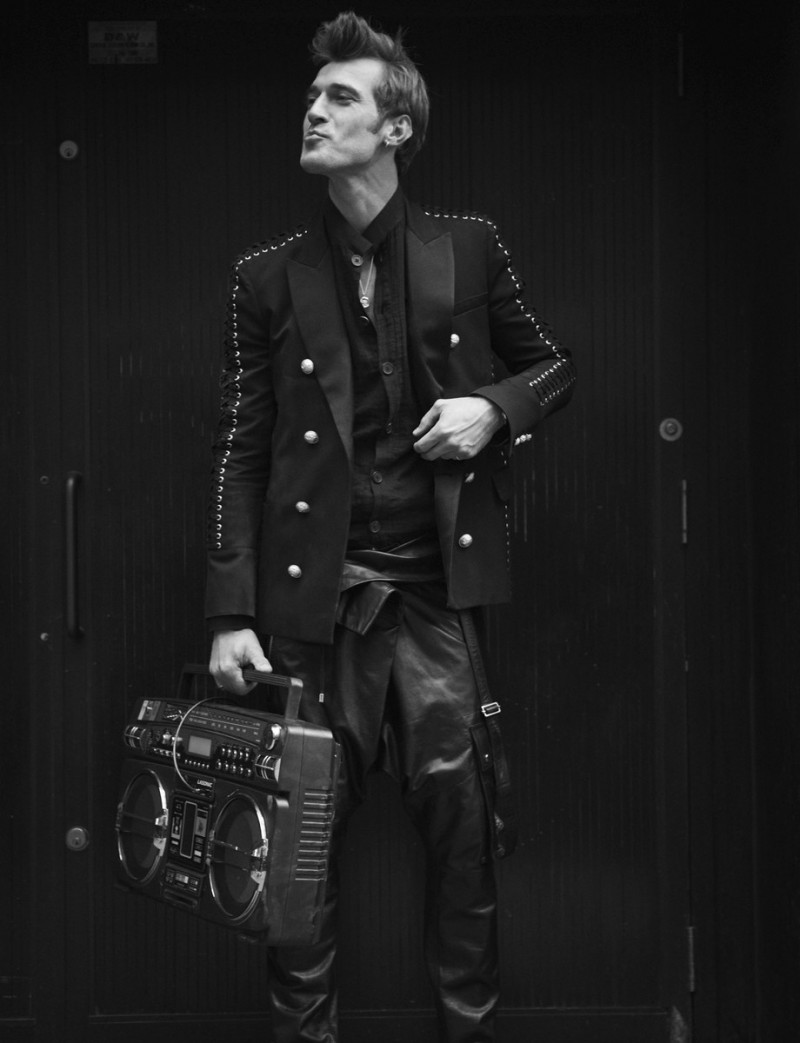 Clément Chabernaud rocks a black look from Parisian brand Balmain.