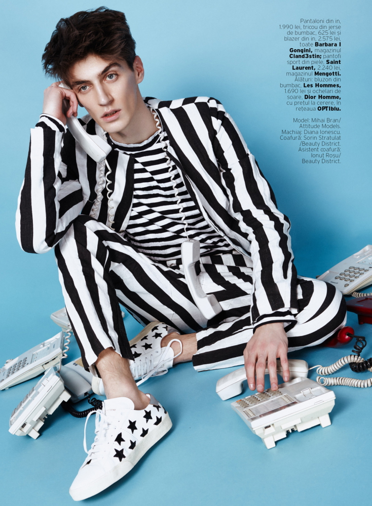 Mihai Bran makes a graphic statement in a striped ensemble for a shoot in Elle Man Romania.