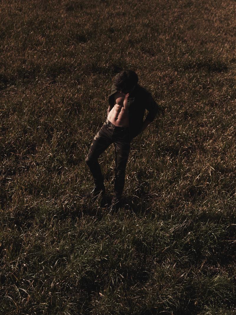 Tommy Dunn styled by Steven Doan in camouflage pants for Elle Man Vietnam.