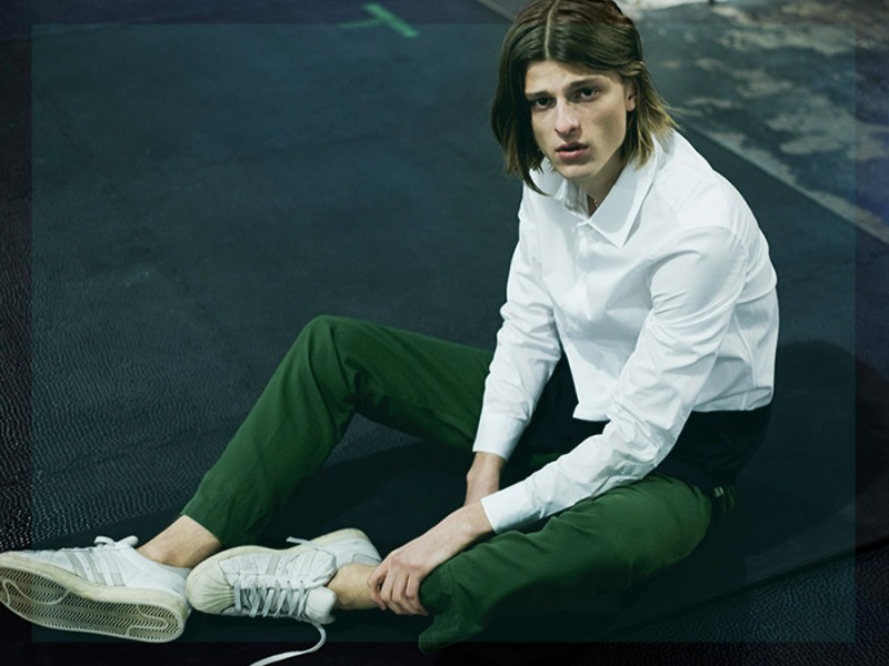Elvis Jankus wears a Marni shirt with Adidas sneakers and vintage trousers.