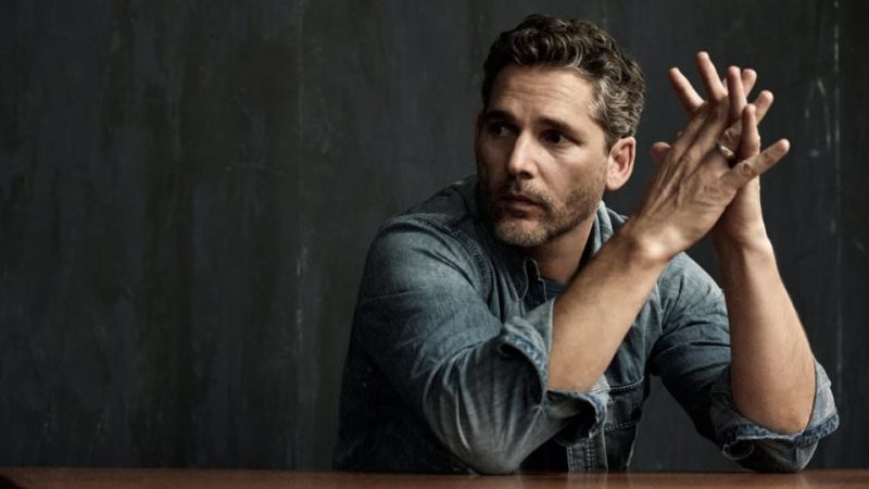 Eric Bana wears denim shirt RRL and jersey t-shirt J.Crew.