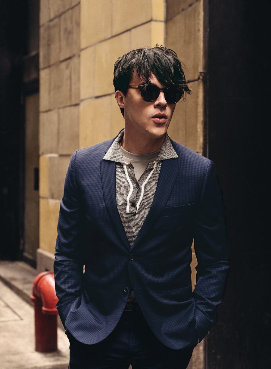 Finn Wittrock heads outdoors in Moscot sunglasses.