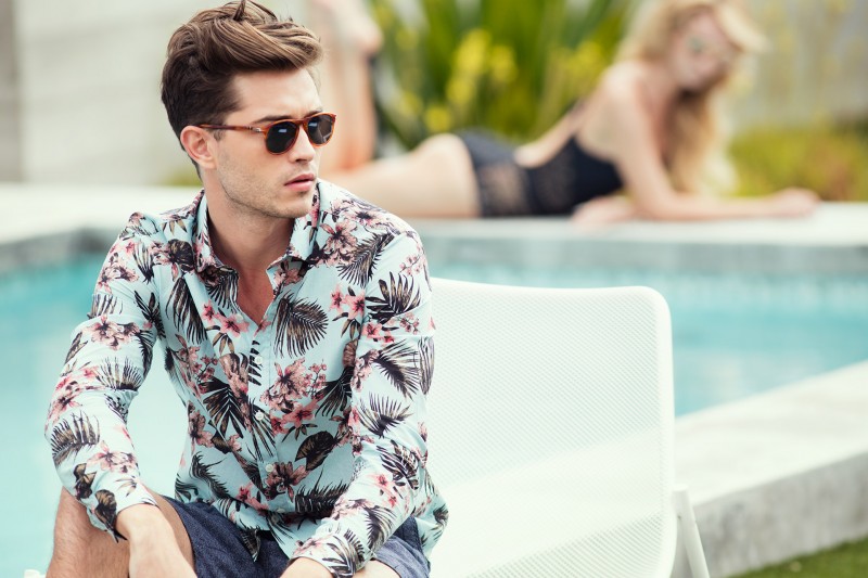 Francisco Lachowski fronts 7 Diamonds' spring-summer 2016 campaign, wearing a Hawaiian shirt poolside.