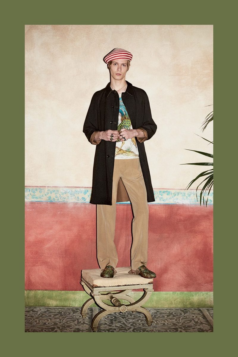 Gucci presents a chic wardrobe for the artist, embracing oversized coats and relaxed trousers.