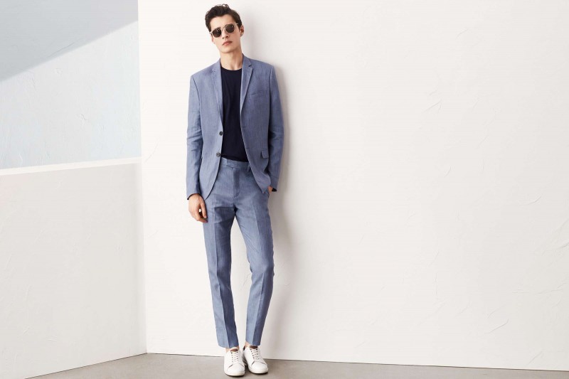 Adrien Sahores models a linen-blend suit with a basic t-shirt from H&M.