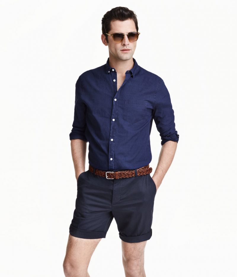 Casual Smarts: Sean O'Pry embraces a confident cool in a smart button-down shirt, worn with slim-fit shorts and a braided belt from H&M.