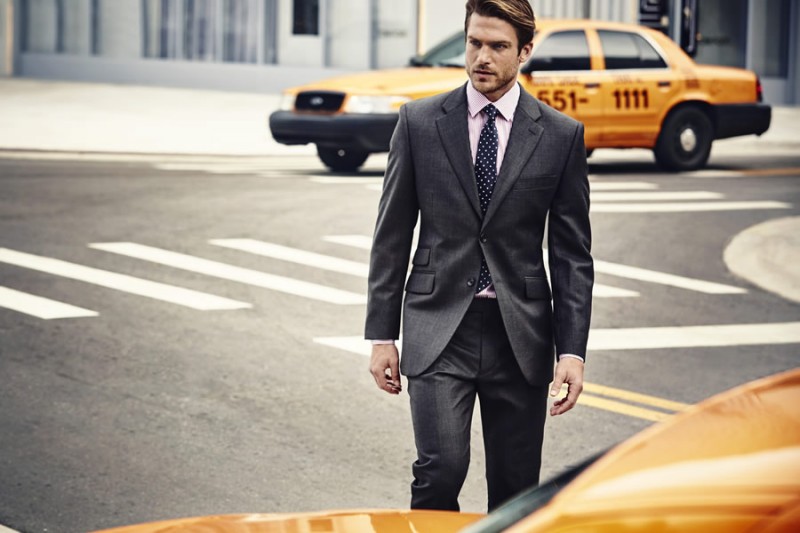 Jason Morgan dons a two-button charcoal suit from House of Fraser's Howick Tailored.