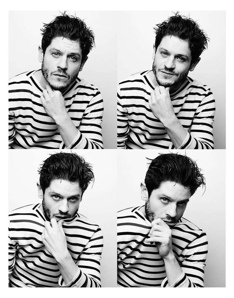 Iwan Rheon rocks a striped top from Gucci.