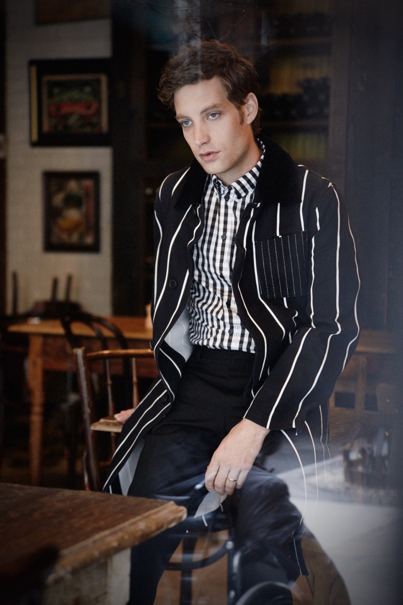 James Jagger has a graphic moment in a striped coat from Givenchy, paired with a Dolce & Gabbana shirt and Diesel jeans.