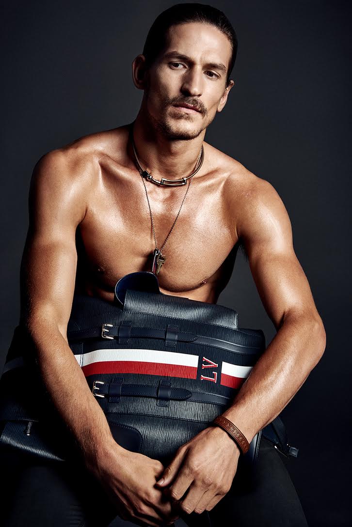 Jarrod Scott poses with Louis Vuitton accessories for GQ Portugal.