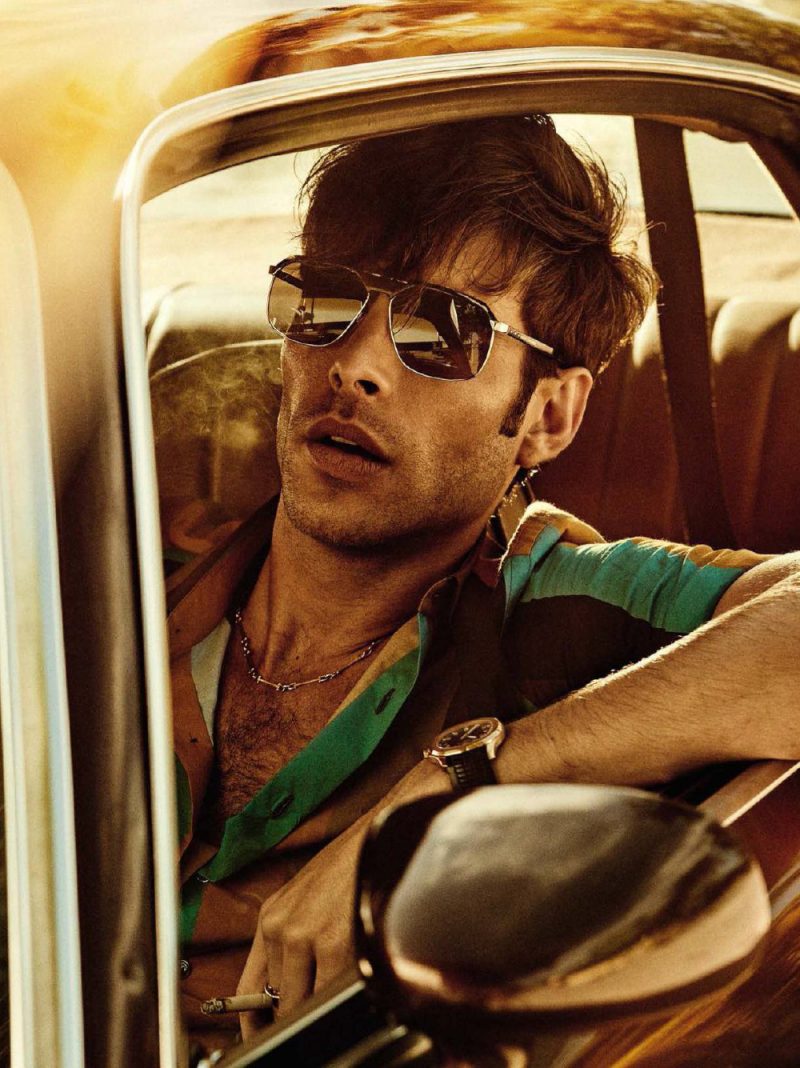 Jon Kortajarena pictured in a Salvatore Ferragamo shirt and Marc Jacobs sunglasses for GQ España.