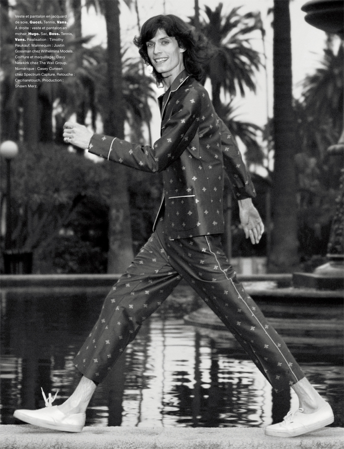Justin Gossman dons an all-over print pajama-inspired look from Gucci with Vans trainers.