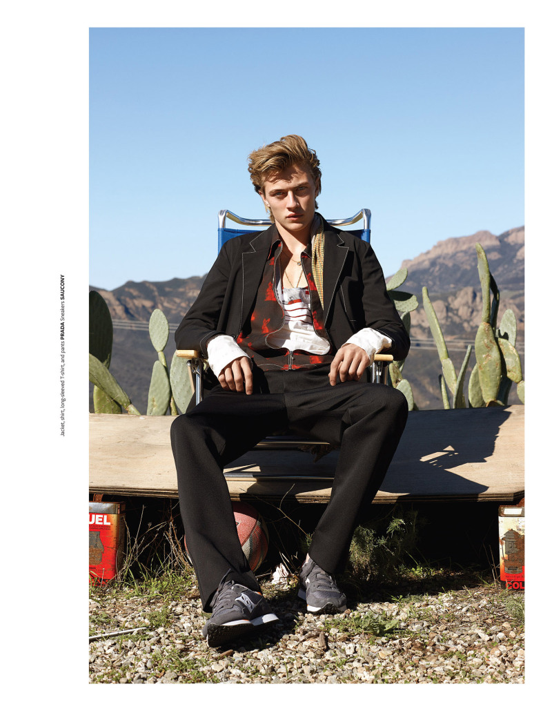 Lucky Blue Smith goes sports luxe in a look from Prada, finished with Saucony sneakers.