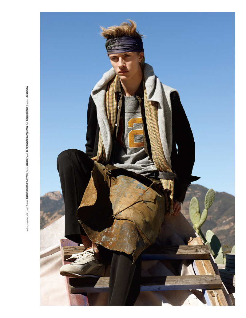 Lucky Blue Smith pictured in fashions from Abercrombie & Fitch, combined with Marni trousers, an Alexander McQueen scarf, a Dsquared2 belt and Diadora sneakers.
