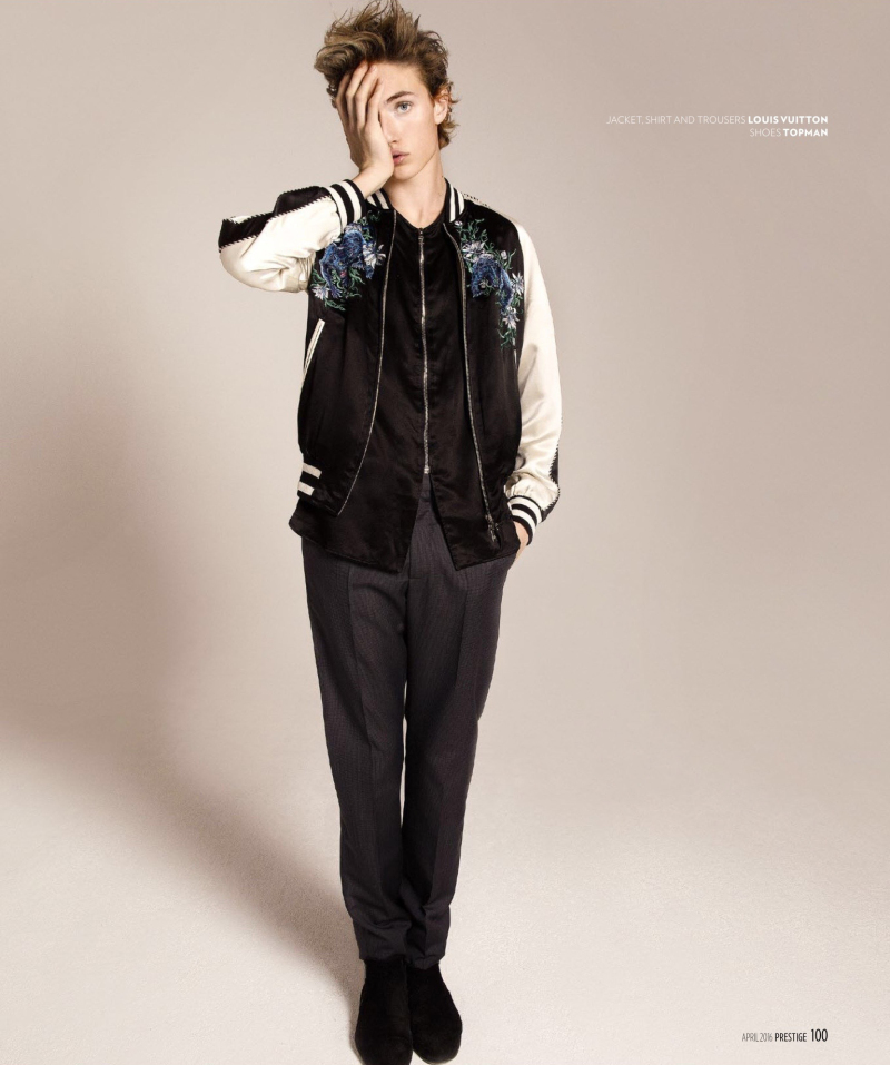 Lucky Blue Smith models a trendy souvenir jacket from Louis Vuitton.