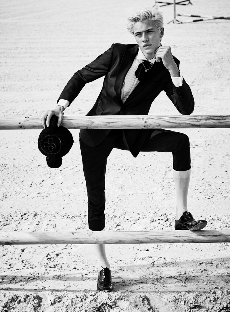 Lucky Blue Smith cuts a dandy shape, wearing shoes Christian Louboutin, shirt and suit Hatemoğlu.