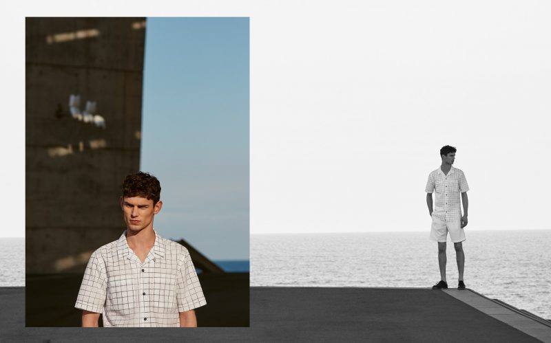 Arthur Gosse wears grid print short-sleeve shirt, Bermuda shorts and shoes Mango.