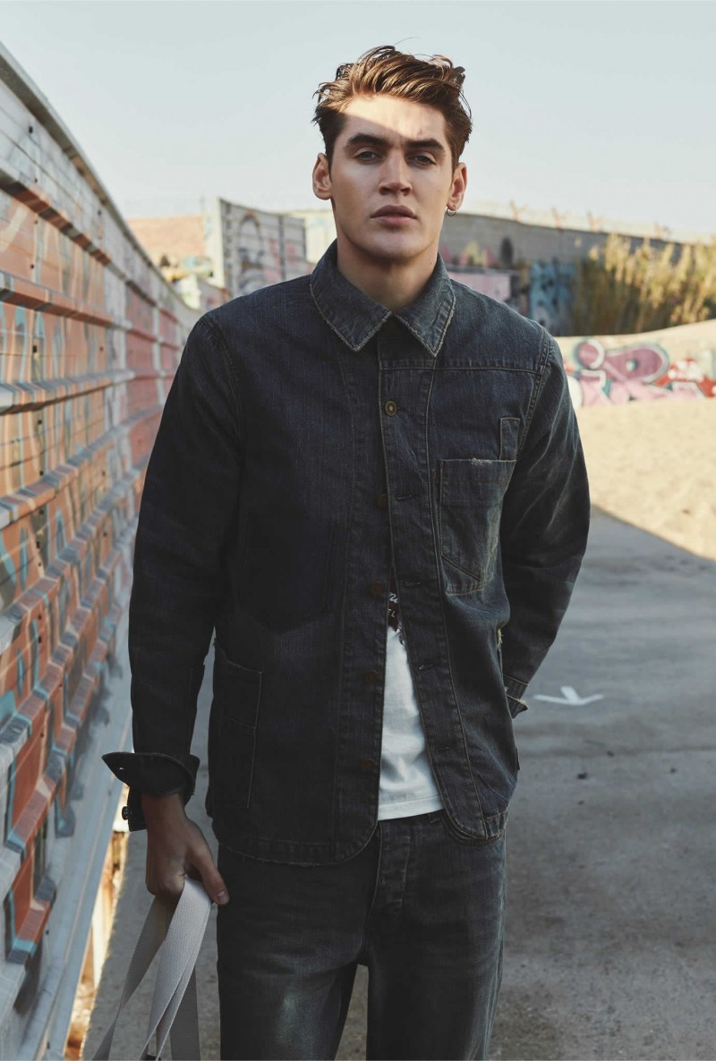 Isaac Carew doubles down on denim in a jacket and jeans from Mango Blacksmith Denim.