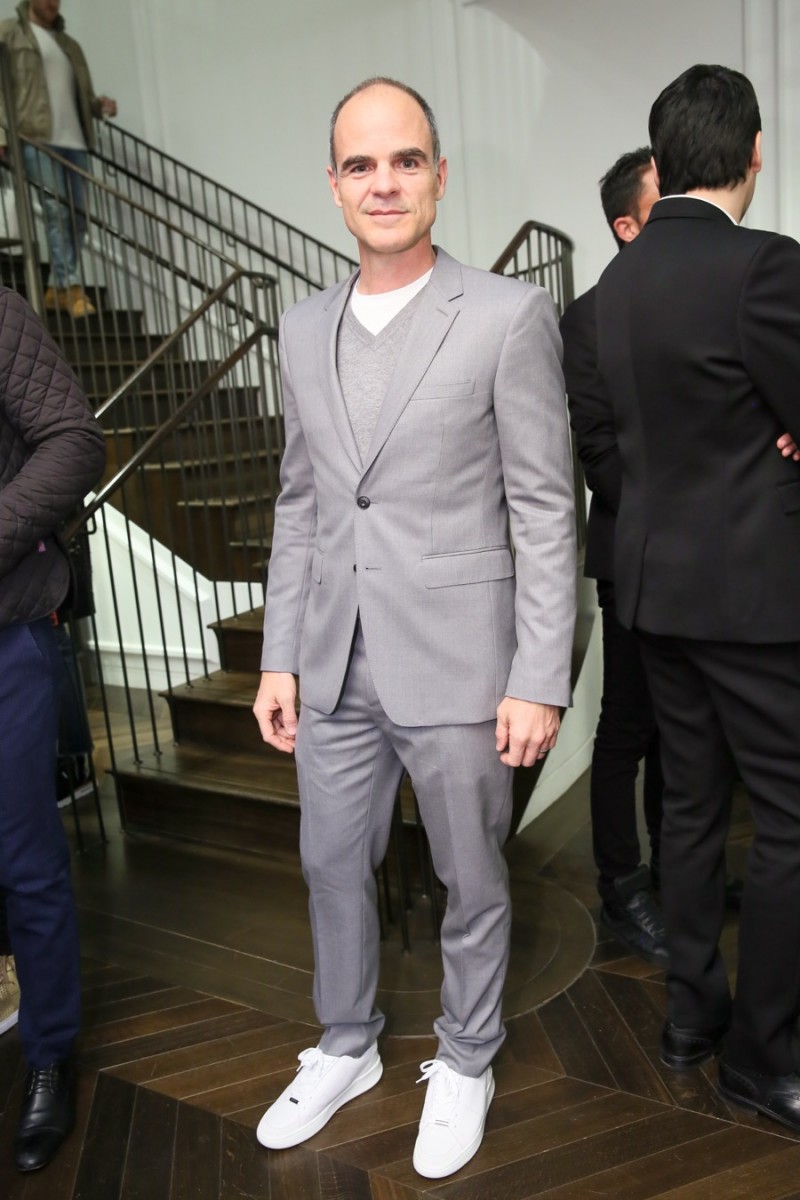 Michael Kelly pictured in a Burberry suit at a launch event for Mr. Burberry.
