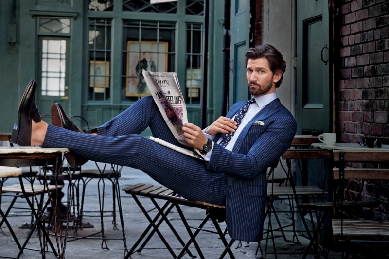 Michiel Huisman dons pinstripe suit Ralph Lauren.