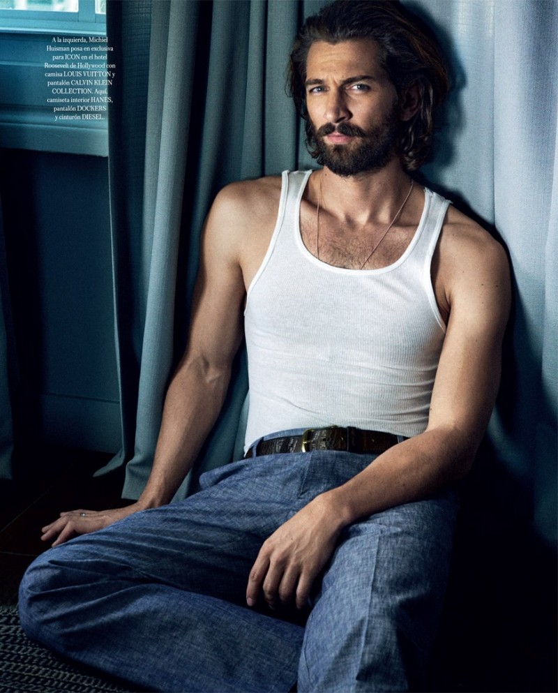Michiel Huisman goes casual in a Hanes wifebeater and Dockers trousers.