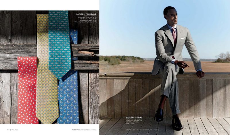 Corey Baptiste dons a grey striped suit from Oxxford Clothes.