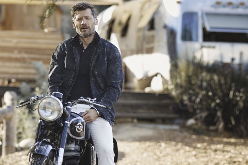 Pictured in a plaid jacket, Nikolaj Coster-Waldau goes casual on the back of a bike.