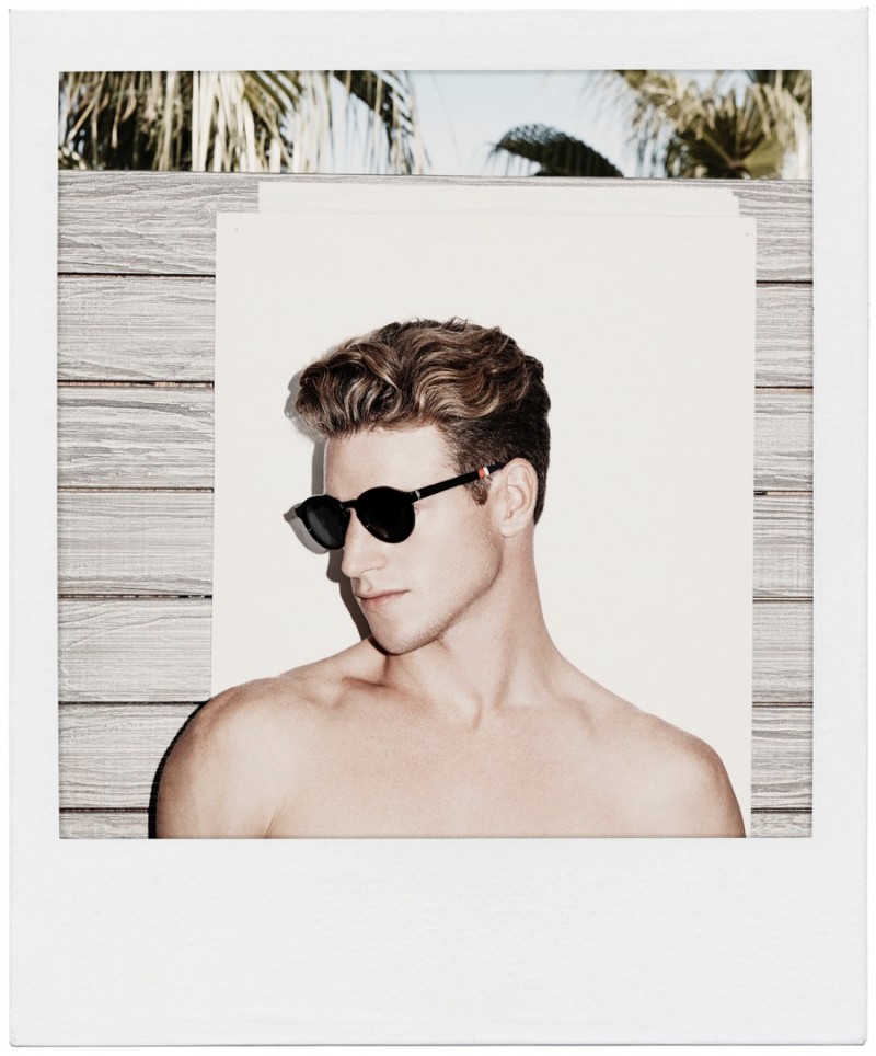 Roger Frampton models Orlebar Brown's black/dark grey Grandy Sunglasses.