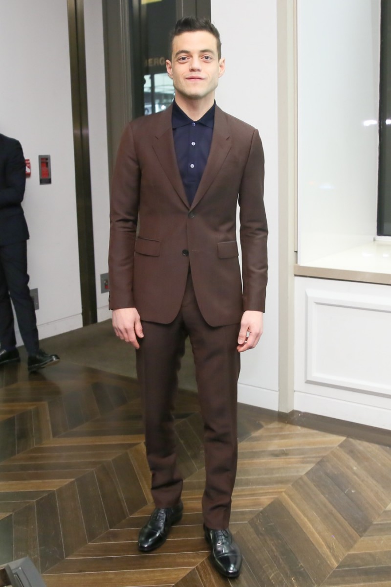 Rami Malek pictured in a Burberry suit at a launch event for Mr. Burberry.