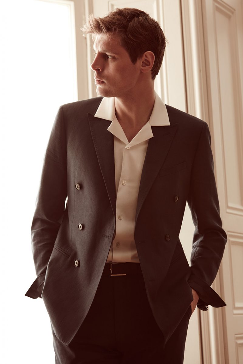 Adrian Wlodarski wears Falcon Cuban collar short-sleeve shirt, Ceaser B double-breasted jacket and trousers from Reiss.
