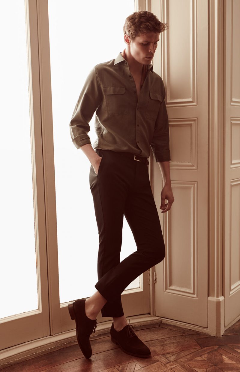 Adrian Wlodarski wears Whiplash overshirt, George T trousers, Ricky belt and Colden shoes from Reiss.