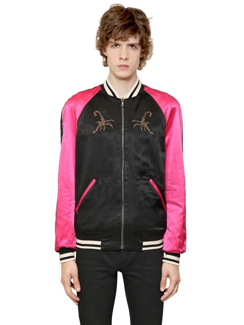 Roberto Cavalli Satin Souvenir Jacket: Italian fashion brand Roberto Cavalli is ready to dress the king of cool with its hot pink and black take on the iconic souvenir jacket.