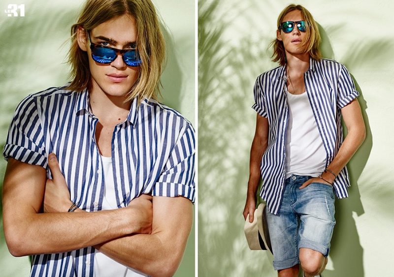Simons Le 31: Model Ton Heukels is a cool summer vision in a vertical stripe short-sleeve shirt, paired with a white tank and distressed denim shorts.
