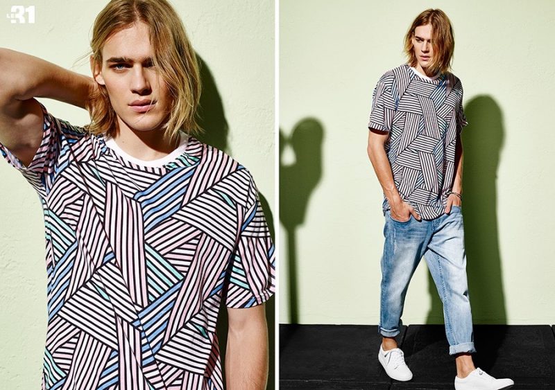 Graphic Appeal: Ton Heukels embraces relaxed proportions in a graphic t-shirt and slouchy denim jeans. » Simons Le 31 Style: Ton Heukels Exudes Summer Cool Graphic Appeal: Ton Heukels embraces relaxed proportions in a graphic t-shirt and slouchy denim jeans.