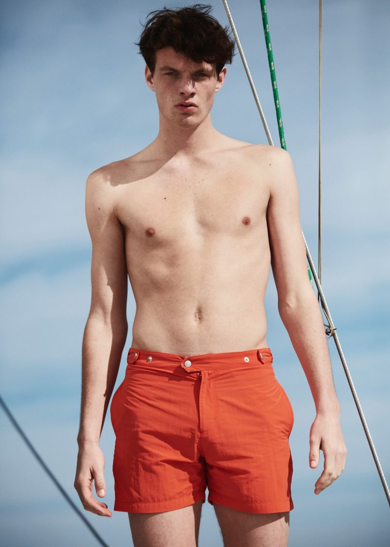 Rocky Harwood models Solid & Striped swim shorts.