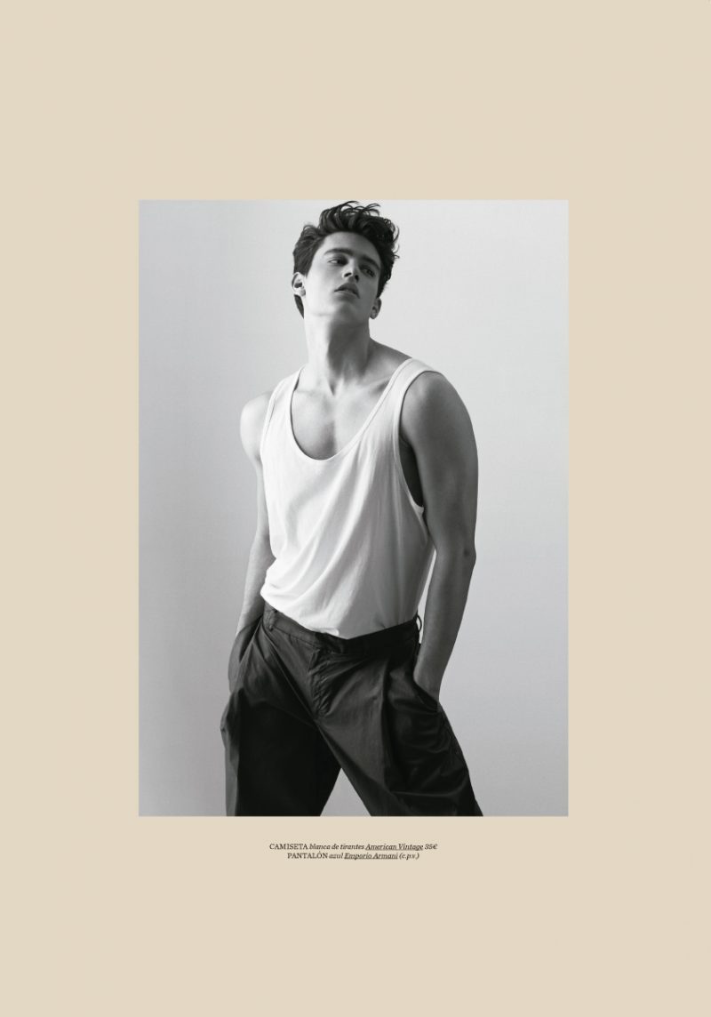 Xavier Serrano dons minimal fashions from American Vintage and Emporio Armani.