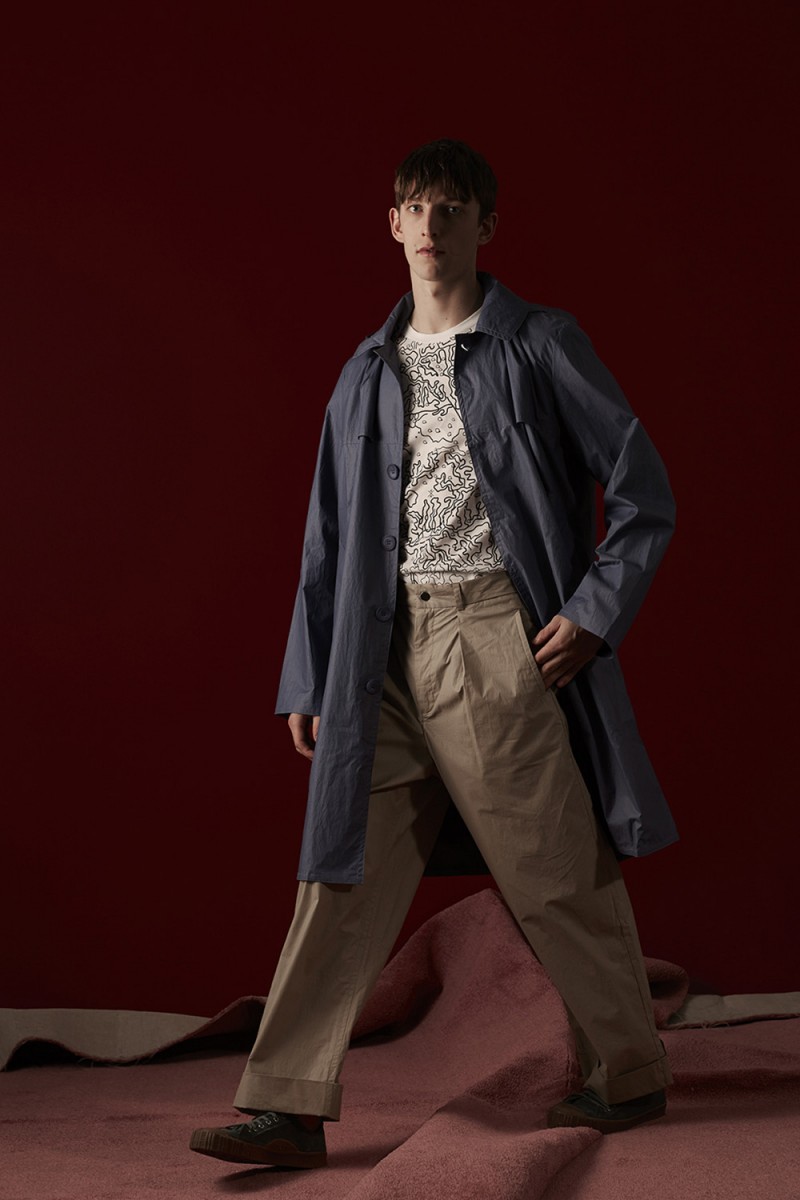 Max Townsend wears all clothes Christopher Raeburn and canvas high-top sneakers Adieu.