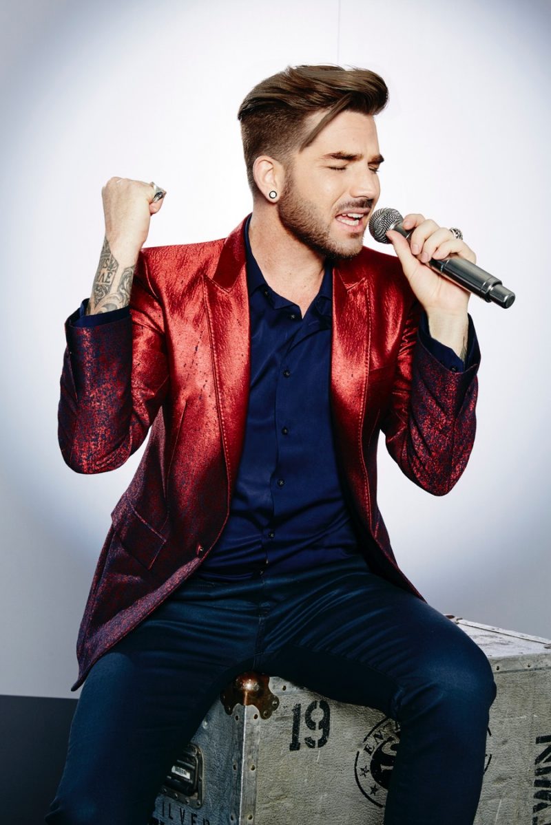 Adam Lambert has a glitzy moment in a red blazer from INC International Concepts.