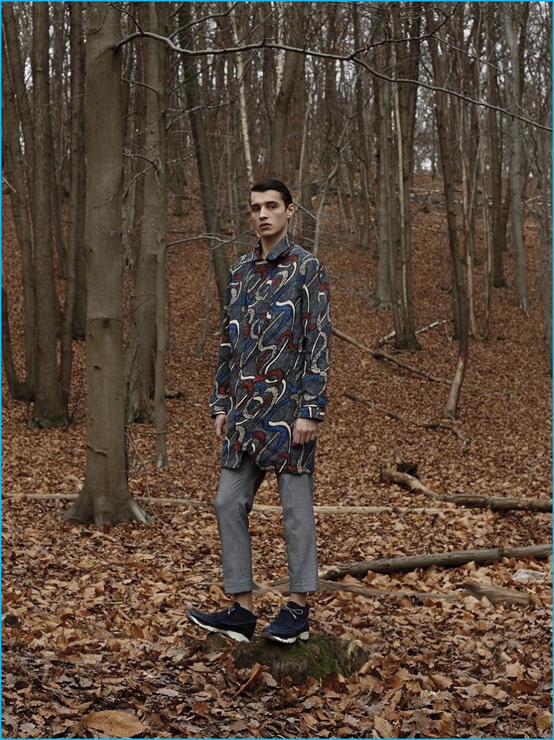 Adrien Sahores rocks a graphic coat from Carven's spring-summer 2016 collection.