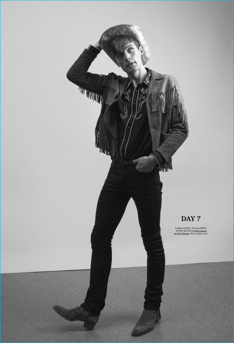 Alexander Stoltz goes western in a suede fringe jacket, western shirt, skinny jeans and ankle boots from Saint Laurent by Hedi Slimane.