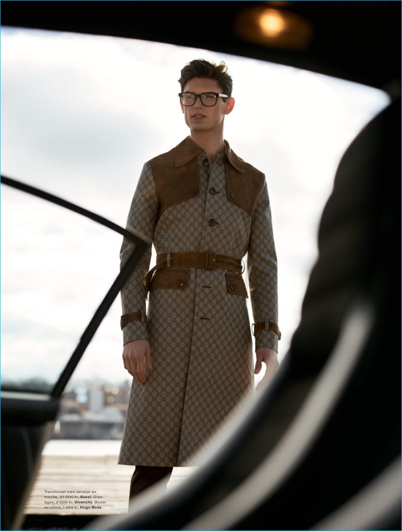 Arthur Gosse dons a sleek coat from Italian fashion house Gucci.