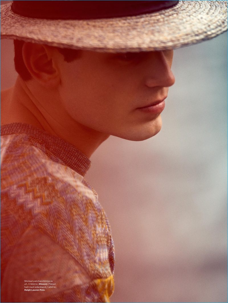 Arthur Gosse captures the spirit of the season in a straw hat from Polo Ralph Lauren.