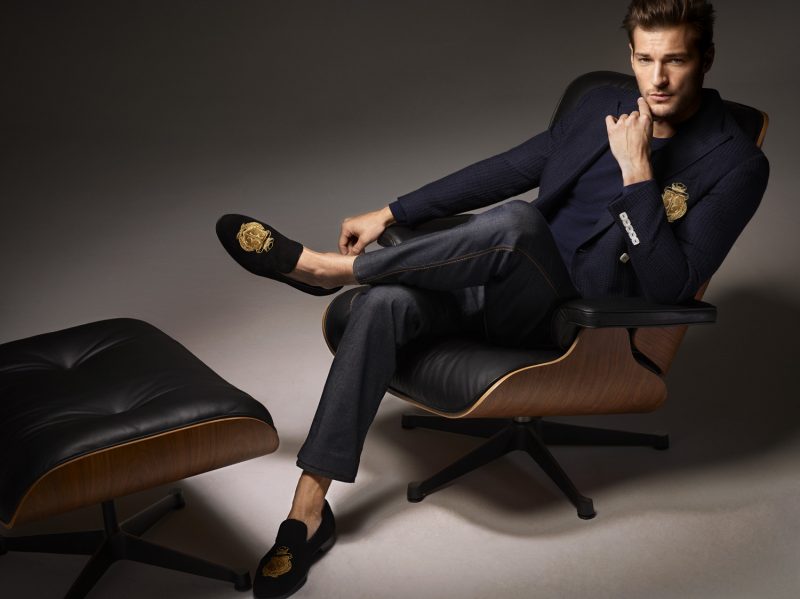 Dan Murphy lounges in a crested jacket and slippers for Billionaire's spring-summer 2016 campaign.