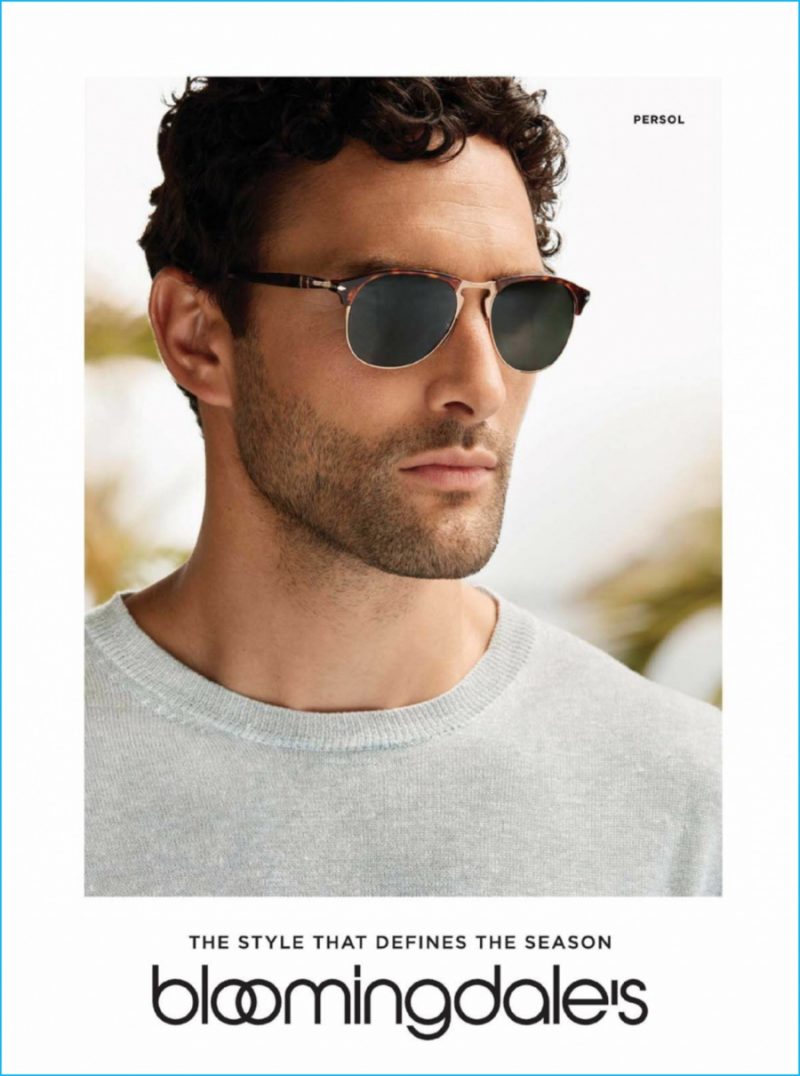 Noah Mills rocks Persol sunglasses.