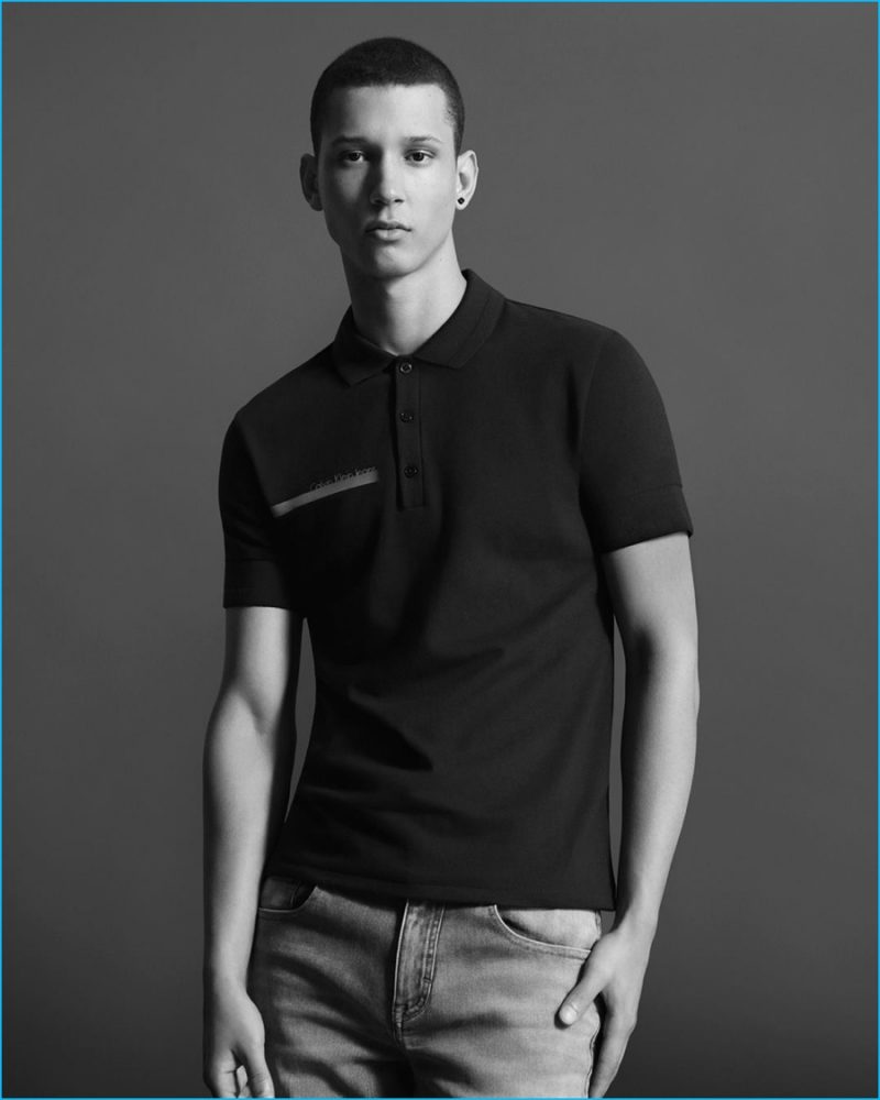 Abiah Hostvedt pictured in a black Calvin Klein Jeans polo shirt.