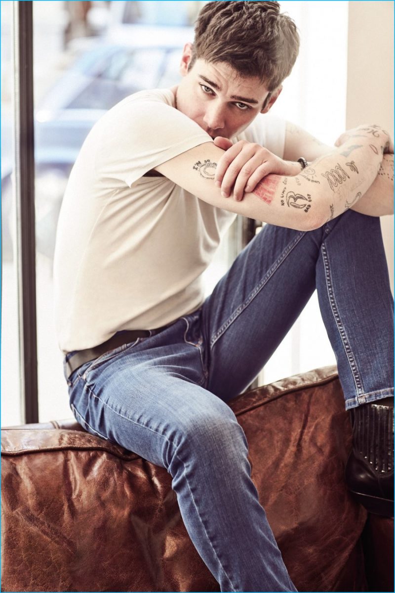 Cole Mohr relaxes in a classic t-shirt and distressed denim jeans for Koton Jeans' spring-summer 2016 campaign.