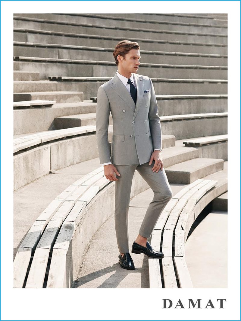 Shaun DeWet pictured in a tailored double-breasted suit fro Damat's spring-summer 2016 campaign.